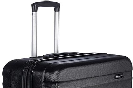 Amazon Basics Valise Rigide Grande – Bagage de Voyage Extensible ABS avec 4 Roulettes Doubles Pivotantes – Résistante aux Rayures et Légère – 78 x 52,6 x 32cm – Noir